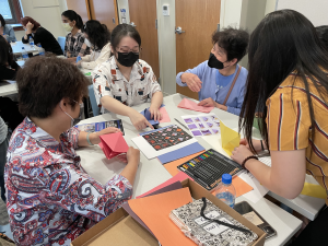 Students collaborate with older adults in co-design workshop